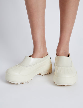 Proenza Schouler image of model wearing SOREL x Proenza Schouler CARIBOU Mule WP in CHALK/BLACK