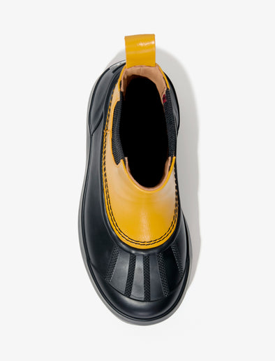 Proenza Schouler aerial image of SOREL x Proenza Schouler CARIBOU Chelsea WP in GOLDEN OCHRE/BLACK