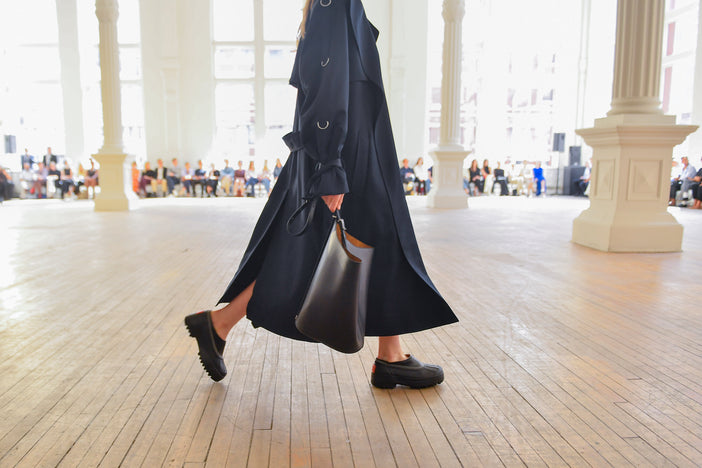 Image of model walking SS25 runway wearing SOREL x Proenza Schouler Caribou mules