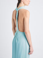 Detail image of model wearing Selena Twist Back Dress in Matte Viscose Crepe in pale blue