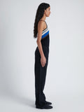 Side image of model wearing Bella Tank in Crochet Stripe Knit in black multi