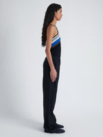 Side image of model wearing Bella Tank in Crochet Stripe Knit in black multi