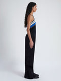 Side image of model wearing Naomi Dress in Crochet Stripe Knit in black multi