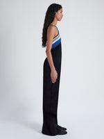 Side image of model wearing Naomi Dress in Crochet Stripe Knit in black multi