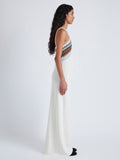 Side image of model wearing Naomi Dress in Crochet Stripe Knit in white multi