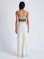 Back image of model wearing Naomi Dress in Crochet Stripe Knit in white multi