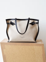 Days Tote in Natural Linen in natural/black on cardboard platform