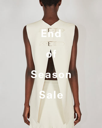 Cropped back image of model wearing Noa Top in Textured Leather in ivory, 'End of Season Sale' overlaid