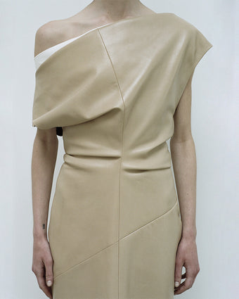 Cropped image of model wearing Rosa Dress in Smooth Leather in light khaki