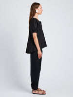 Proenza Schouler Full Length Side Image of model wearing Serene Pant in Cotton Twill in Black