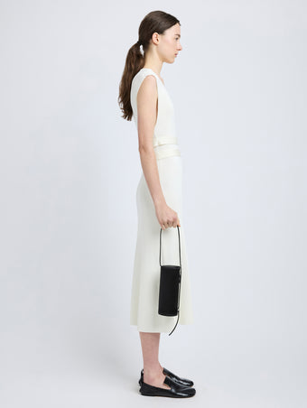 Proenza Schouler image of model carrying Silo Bag in Satin in black