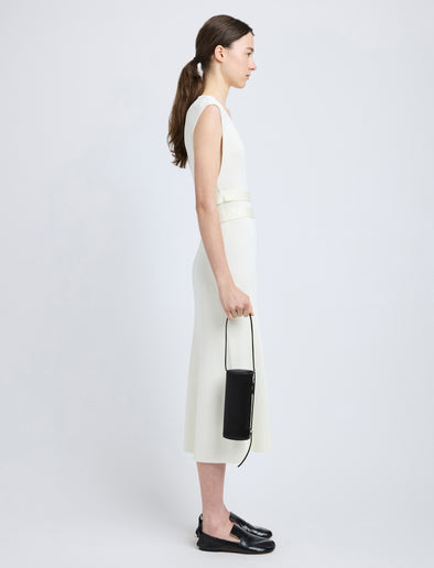 Proenza Schouler image of model carrying Silo Bag in Satin in black