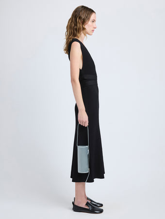 Proenza Schouler image of model carrying Silo Bag in Satin in smoke