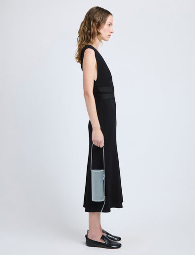 Proenza Schouler image of model carrying Silo Bag in Satin in smoke