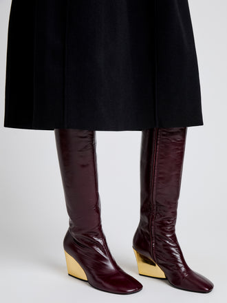 Proenza Schouler Detail image of Slant Boots in Slick Calf in Currant