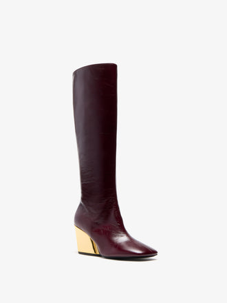 Proenza Schouler 3/4 Front image of Slant Boots in Slick Calf in Currant