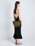 Proenza Schouler Image of model holding Small Ruched Tote in Soft Suede in Olive