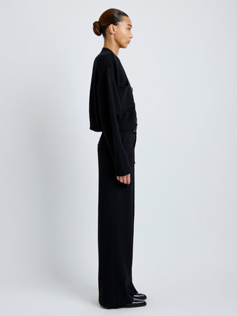 Proenza Schouler Full length side image of model wearing Sofia Cardigan in Eco Cashmere in black