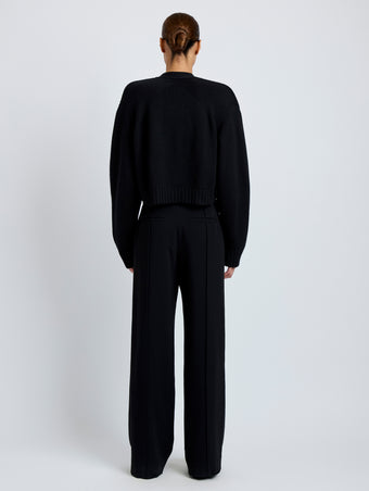 Proenza Schouler Full length back image of model wearing Sofia Cardigan in Eco Cashmere in black