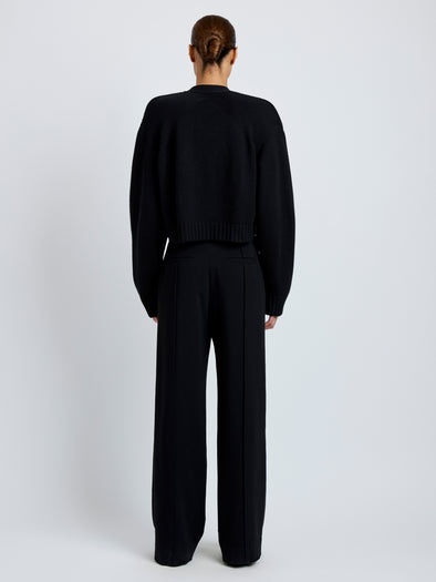 Proenza Schouler Full length back image of model wearing Sofia Cardigan in Eco Cashmere in black