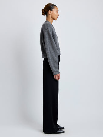 Side image of model wearing Eco Cashmere Cardigan in GREY MELANGE