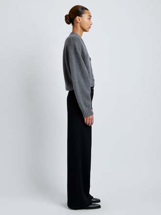 Side image of model wearing Eco Cashmere Cardigan in GREY MELANGE