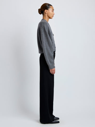 Side image of model wearing Eco Cashmere Cardigan in GREY MELANGE
