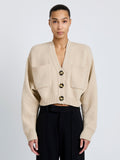 Front cropped image of model wearing Sofia Cardigan In Eco Cashmere in Oatmeal