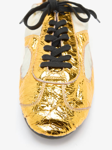 Proenza Schouler Detail image of Soft Track Sneakers in Crinkle Gold 