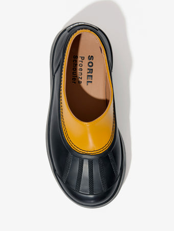 Proenza Schouler aerial image of SOREL x Proenza Schouler CARIBOU Mule WP in GOLDEN OCHRE/BLACK