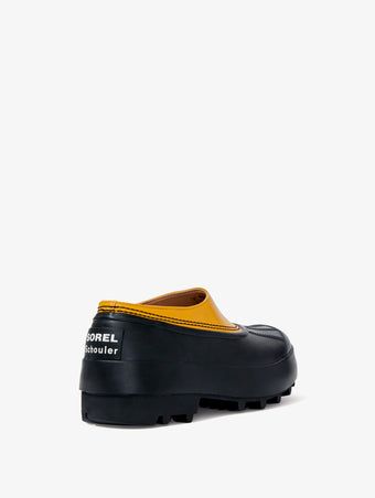 Proenza Schouler back 3/4 image of SOREL x Proenza Schouler CARIBOU Mule WP in GOLDEN OCHRE/BLACK