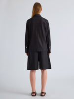 Proenza Schouler Back Full Length on Model Image of Stella Jacket in Stretch Twill in Indigo