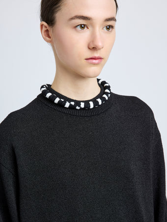 Proenza Schouler model wearing Striped Knit Rolo Necklace in black/white