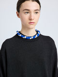 Proenza Schouler model wearing Striped Knit Rolo Necklace in cobalt multi