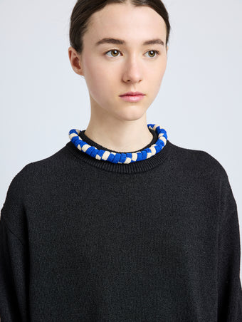 Proenza Schouler model wearing Striped Knit Rolo Necklace in cobalt multi