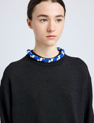 Proenza Schouler model wearing Striped Knit Rolo Necklace in cobalt multi
