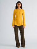 Proenza Schouler Front full length image of model wearing Sukki Jacket in Draped Viscose in Marigold