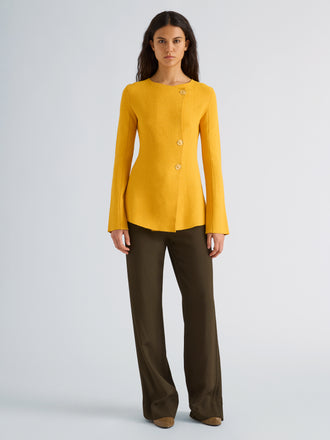 Proenza Schouler Front full length image of model wearing Sukki Jacket in Draped Viscose in Marigold