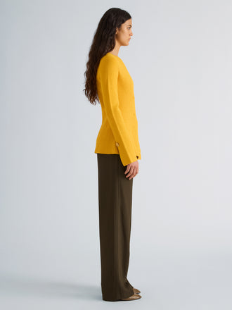 Proenza Schouler Side full length image of model wearing Sukki Jacket in Draped Viscose in Marigold