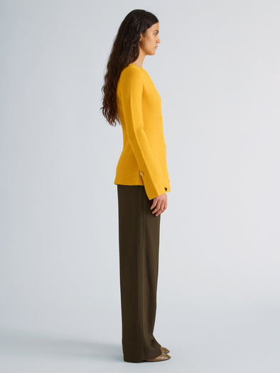 Proenza Schouler Side full length image of model wearing Sukki Jacket in Draped Viscose in Marigold