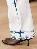 Runway image of Tee Toe Ring Sandals in black/cream