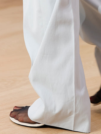Runway image of Tee Toe Ring Sandals in cream/black