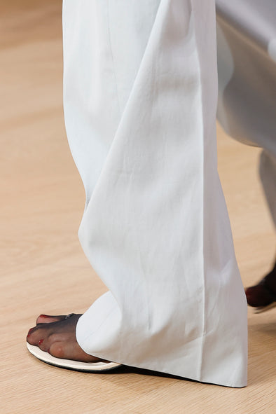 Runway image of Tee Toe Ring Sandals in cream/black
