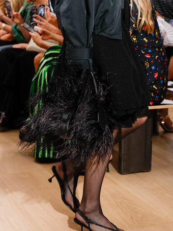 Runway image of Park Shoulder Bag In Nylon With Feathers in black