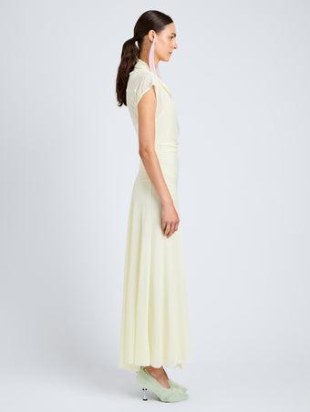 Proenza Schouler Side full length image of model wearing Tamara Dress in Sheer Crepe Jersey in Pale Yellow