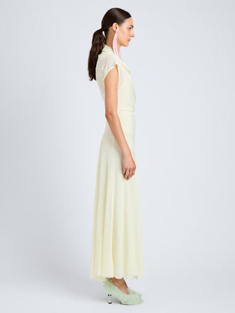 Proenza Schouler Side full length image of model wearing Tamara Dress in Sheer Crepe Jersey in Pale Yellow