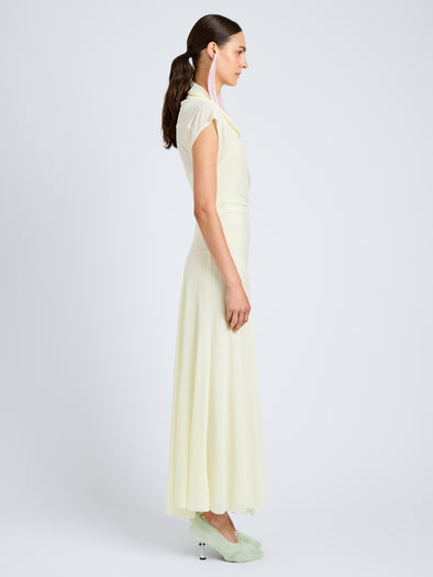 Proenza Schouler Side full length image of model wearing Tamara Dress in Sheer Crepe Jersey in Pale Yellow