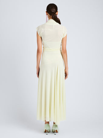 Proenza Schouler Back full length image of model wearing Tamara Dress in Sheer Crepe Jersey in Pale Yellow