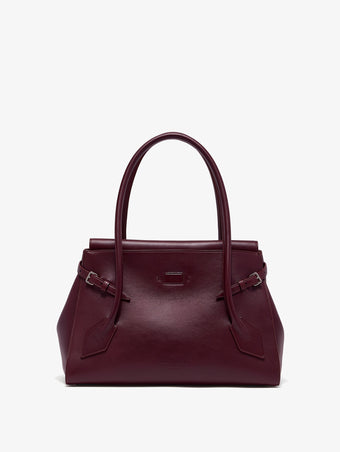 Front image of Tate Bag in Smooth Calfskin in dark red with sides and front flap tucked