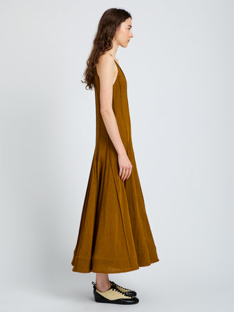 Proenza Schouler side image of model wearing Tavia Dress in Viscose Fringe Knit in olive